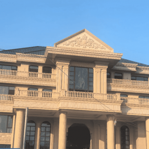 安阳黄金麻别墅外墙干挂石材效果示例