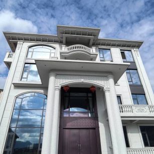 安阳白麻别墅外墙干挂石材效果示例